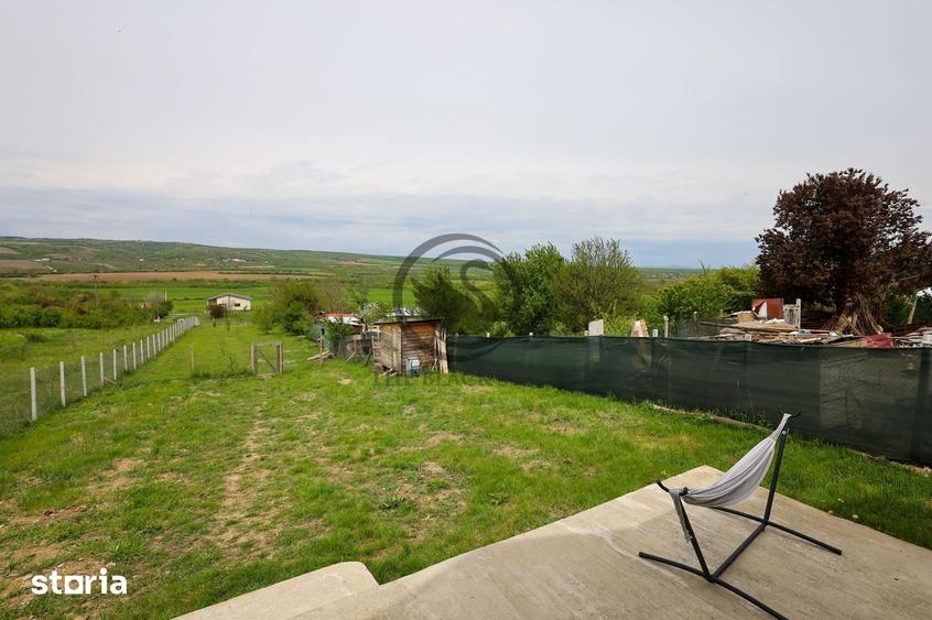 Casă cu 3 camere cu Teren 1500 Mp în Bucov