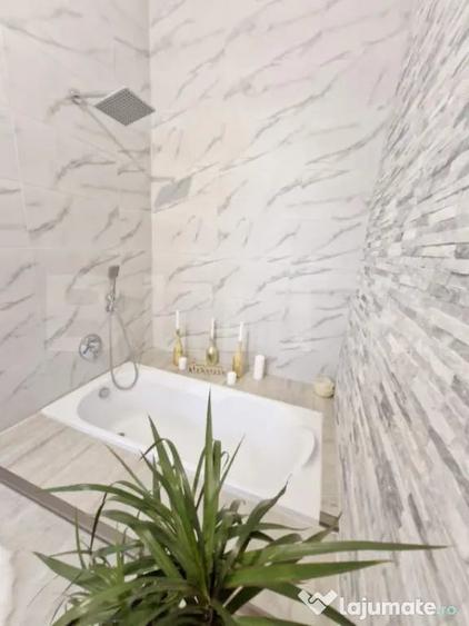 Apartament cu 4 camere semidecomandat în Central