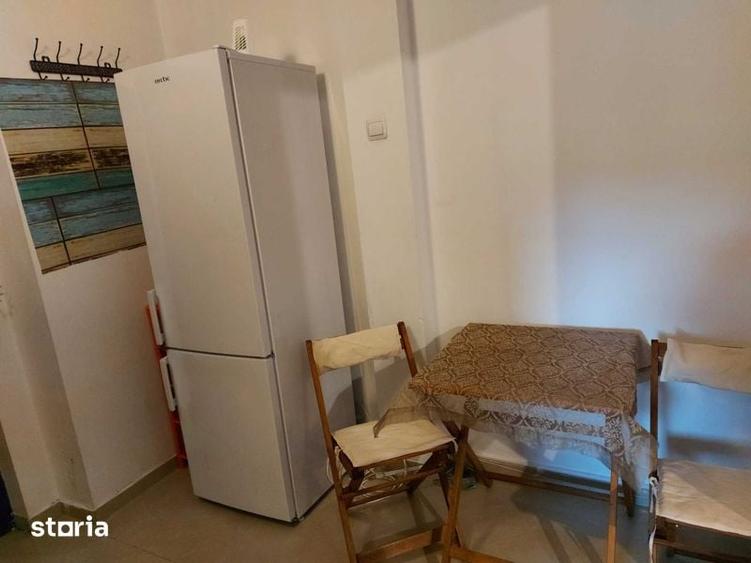 Garsonieră decomandată în Titan