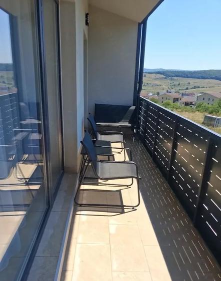 Apartament cu 2 camere semidecomandat, mobilat în Baciu