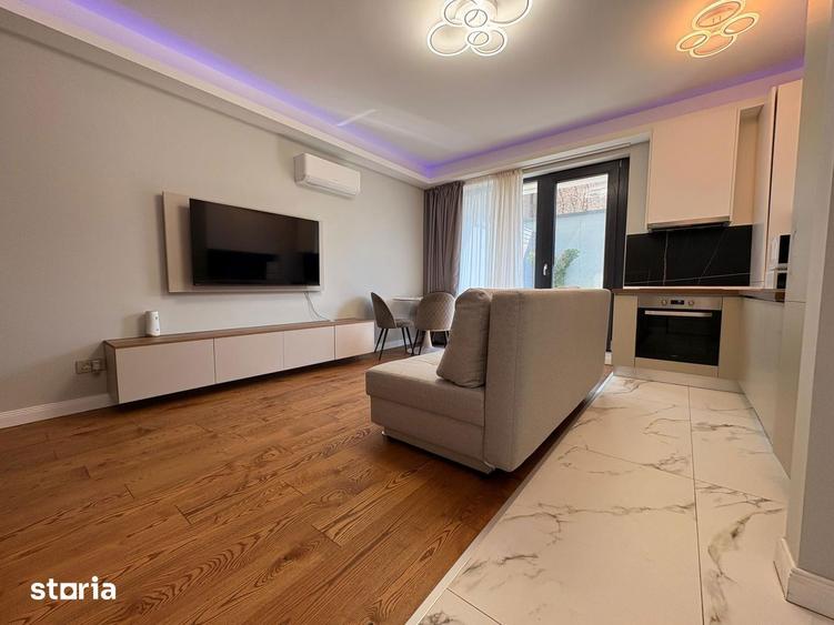 Apartament cu 2 camere, mobilat în Centrul Civic