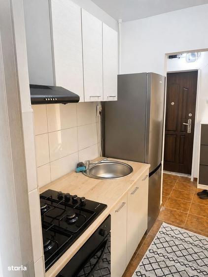 Apartament cu 2 camere semidecomandat în Podul de Piatră