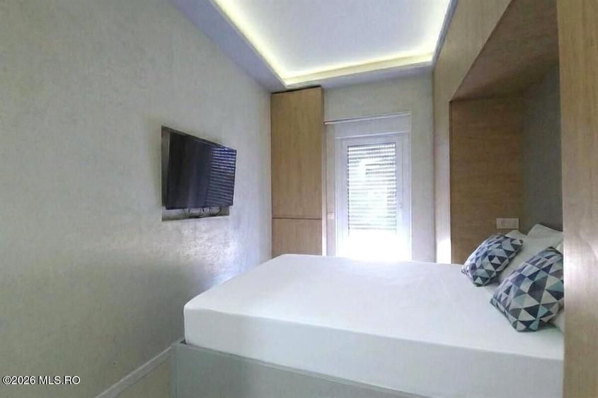 Apartament cu 2 camere semidecomandat, mobilat în Central