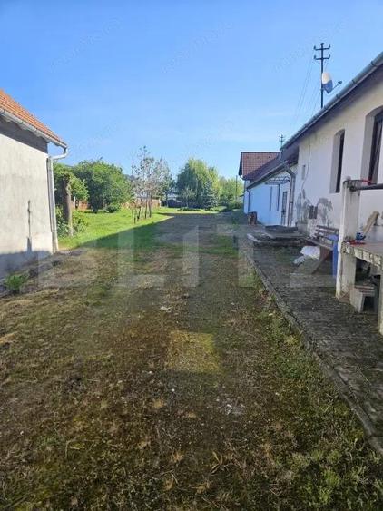 Casă cu Teren 2828 Mp în Central