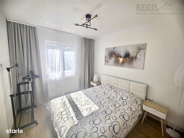 Apartament cu 2 camere semidecomandat, mobilat în Tractorul