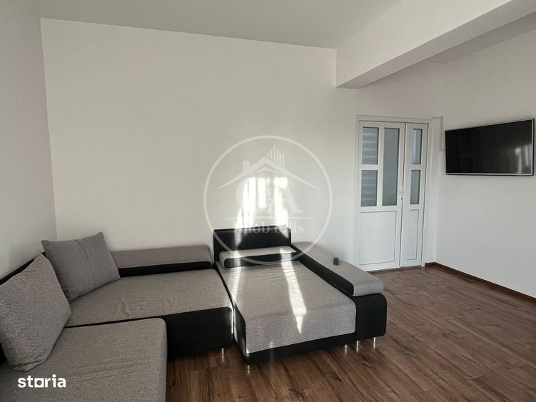 Apartament cu 4 camere decomandat în Rontău