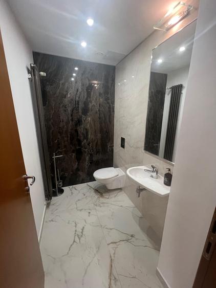Apartament cu 4 camere decomandat în Capitale