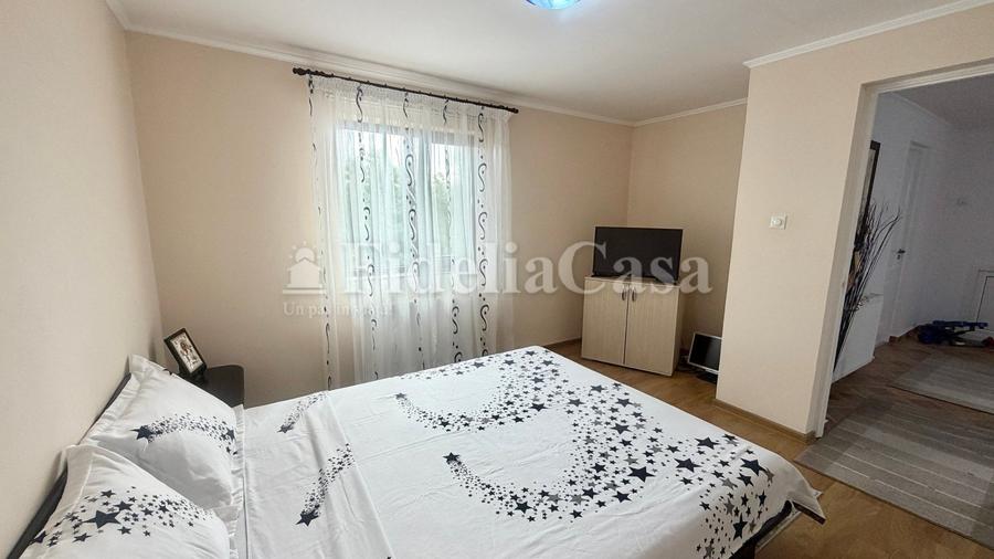 Casă cu 4 camere cu Teren 1453 Mp în Sculeni