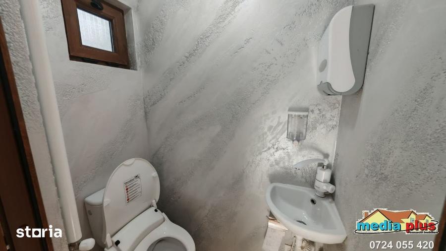 Casă cu 5 camere cu Teren 700 Mp în Piața Centrală