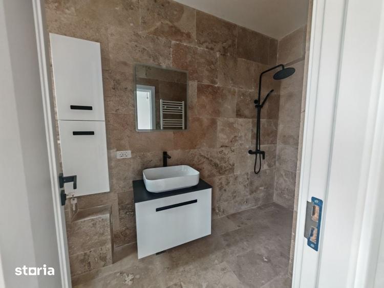 Casă cu 4 camere cu Teren 350 Mp în Tunari
