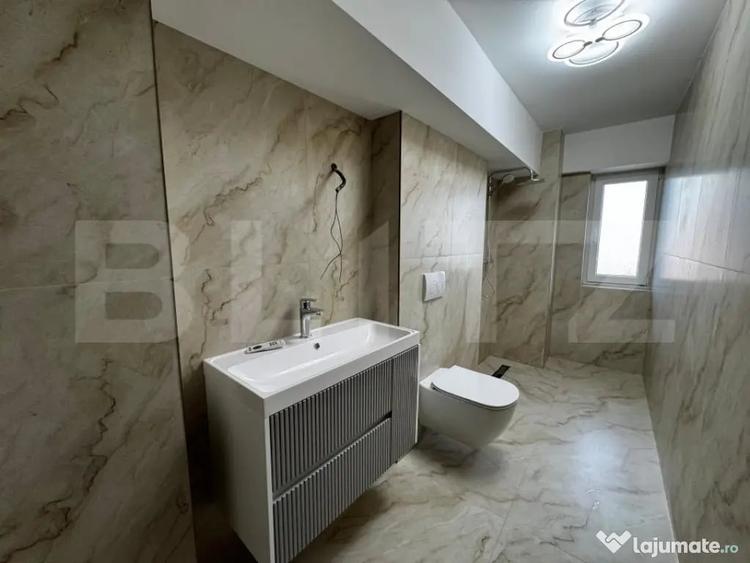 Apartament cu 4 camere decomandat în Central