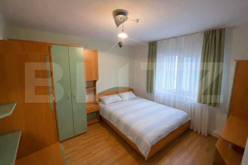 Apartament cu 3 camere semidecomandat, mobilat în Baciu