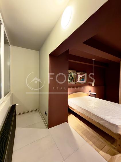 Apartament cu 3 camere semidecomandat, mobilat în Calea Victoriei