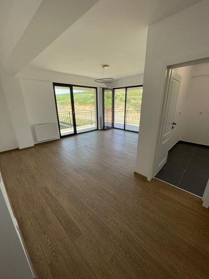 Apartament cu 3 camere decomandat în Bucium