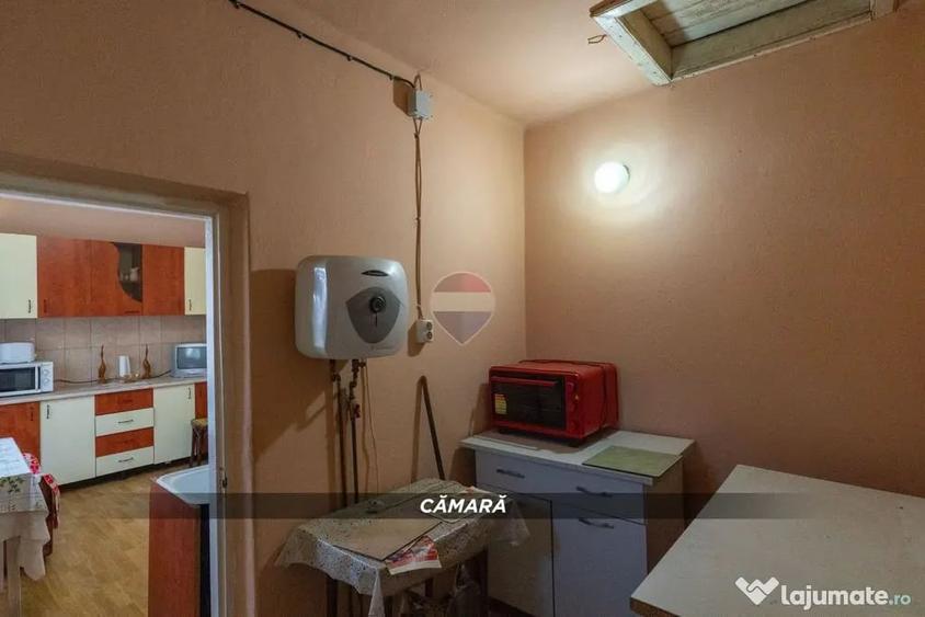 Casă cu 2 camere cu Teren 1300 Mp în Copalnic