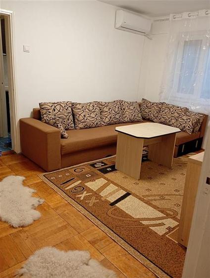 Apartament cu 2 camere semidecomandat, mobilat în Romanilor
