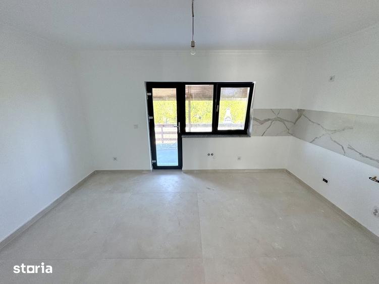 Casă cu 4 camere cu Teren 480 Mp în Bucium