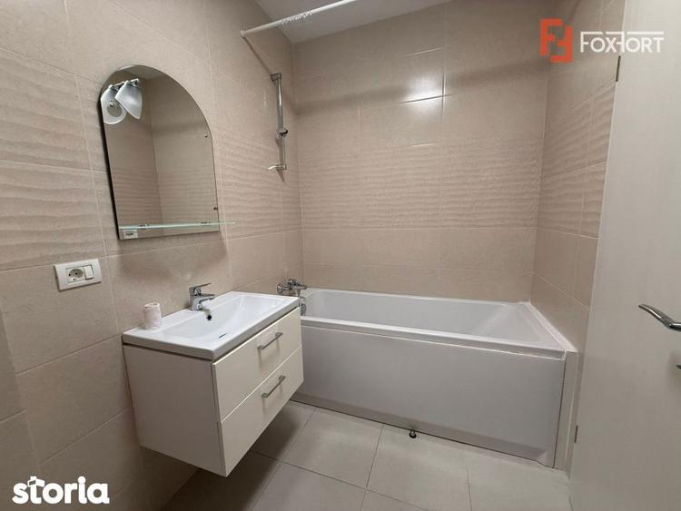 Apartament cu 2 camere semidecomandat, mobilat în Est