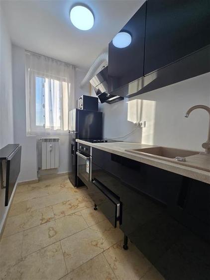 Apartament cu 2 camere decomandat în Podu Roș