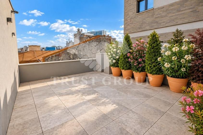 Penthouse cu 4 camere semidecomandat, mobilat în Grădina Icoanei