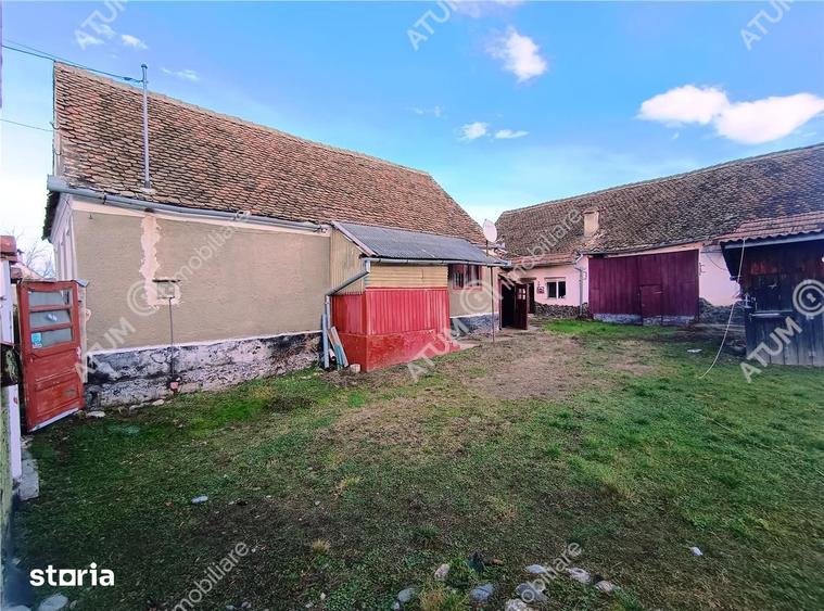 Casă cu 4 camere decomandat cu Teren 1650 Mp în Porumbacu de Jos