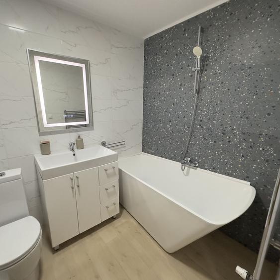Casă cu 4 camere cu Teren 228 Mp în Tunari