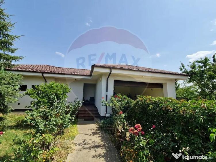 Casă cu 4 camere cu Teren 1065 Mp în Preajba
