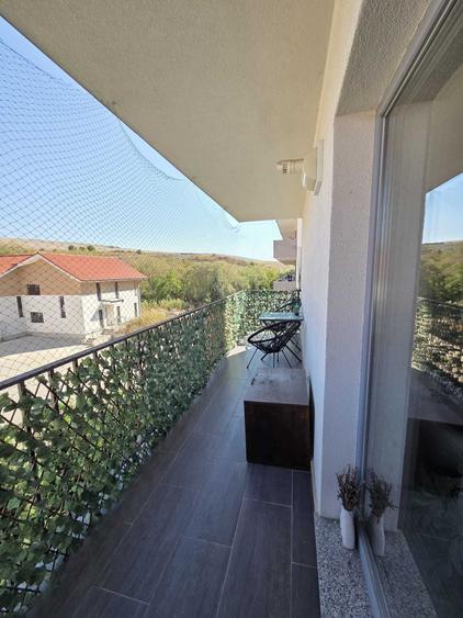 Apartament cu 2 camere semidecomandat în Chinteni
