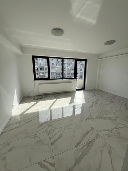 Apartament cu 3 camere semidecomandat în Dorobanți