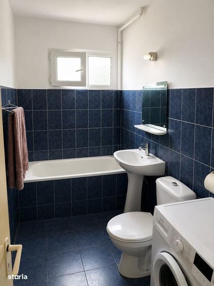 Apartament cu 3 camere semidecomandat, mobilat în Podu Roș
