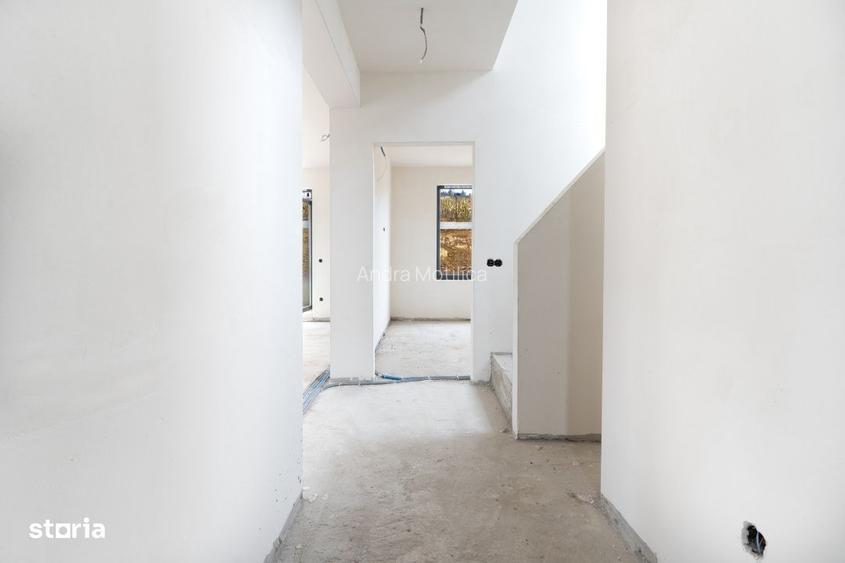 Casa individuala de vanzare in Corusu finisata exterior, interior