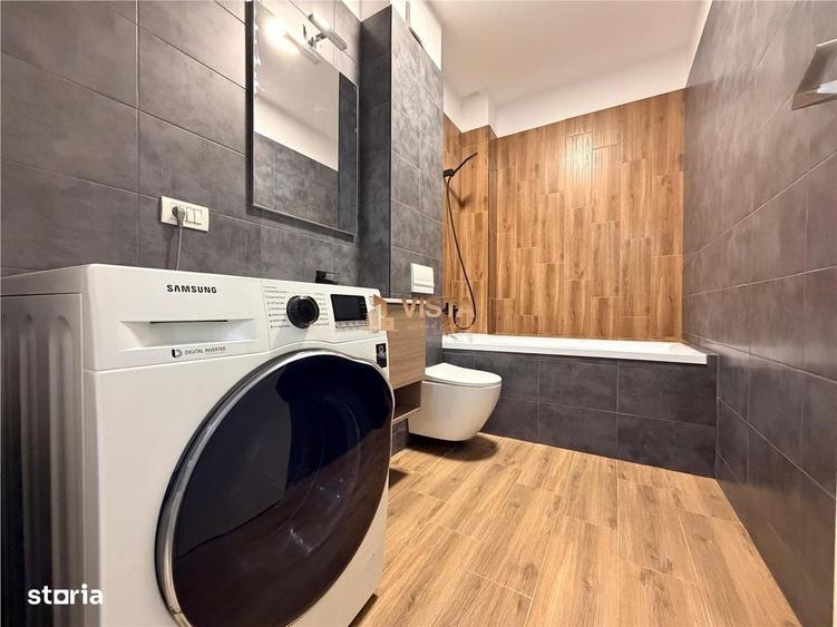 Apartament cu 3 camere decomandat în Tractorul
