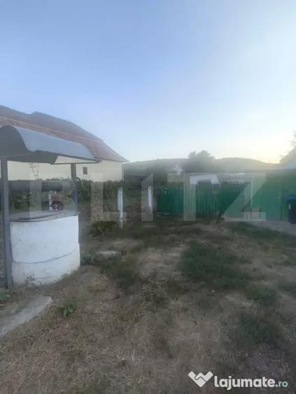 Casă cu 2 camere cu Teren 1133 Mp în Central