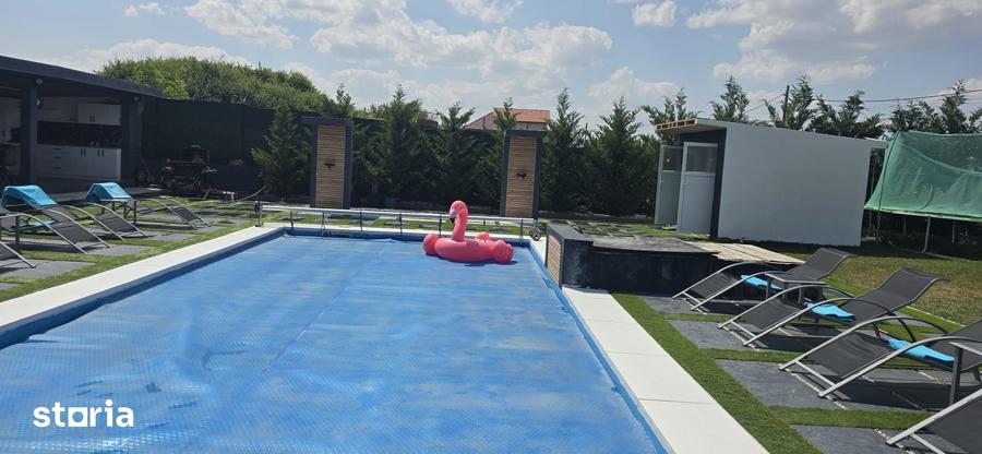 Casă cu 7 camere cu Teren 1500 Mp în Sânmartin