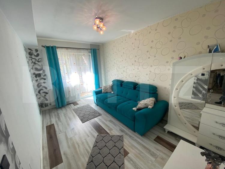 Apartament cu 3 camere semidecomandat, mobilat în Baciu