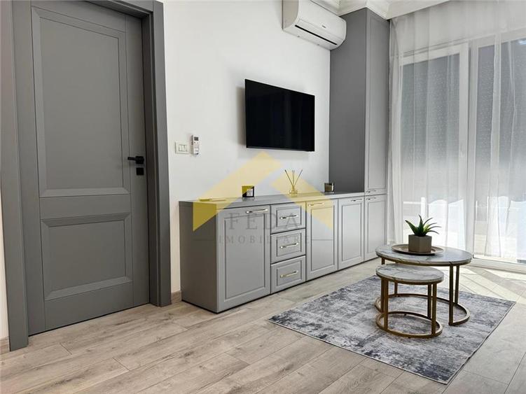Apartament cu 2 camere semidecomandat, mobilat în UTA