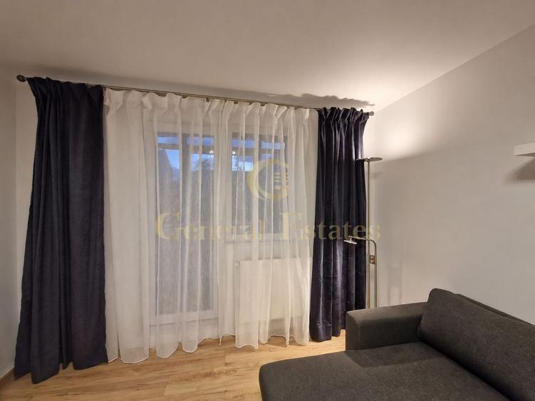 Apartament cu 2 camere semidecomandat, mobilat în Tractorul