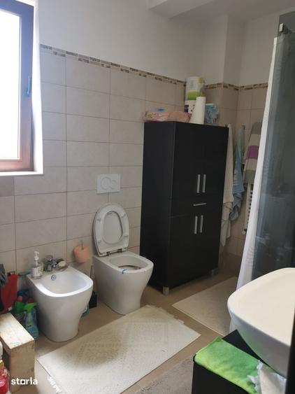 Casă cu 4 camere în Bascov