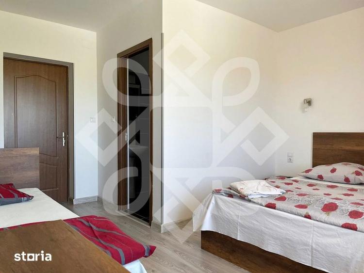 Casă cu 7 camere cu Teren 870 Mp în Sânmartin