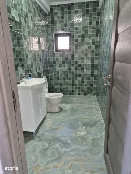 Casă cu 4 camere cu Teren 318 Mp în Central