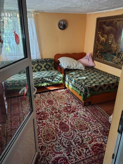 Casă cu 4 camere în Singureni