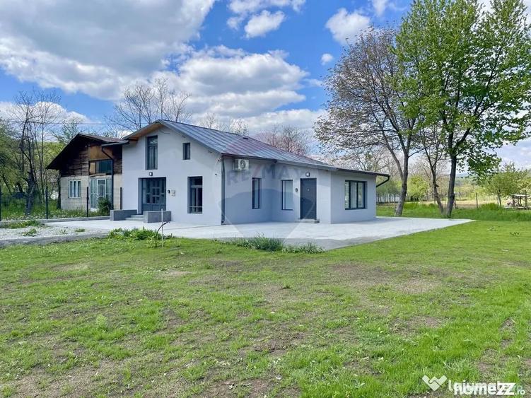 Casă cu 4 camere cu Teren 1397 Mp în Poiana