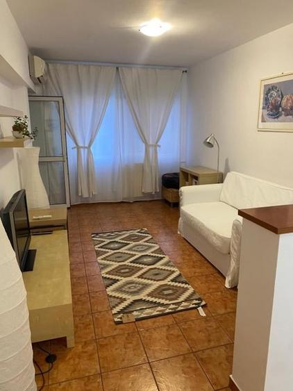 Apartament cu 2 camere semidecomandat, mobilat în Dorobanți