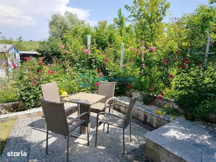 Casă cu 4 camere cu Teren 1000 Mp în Bucov