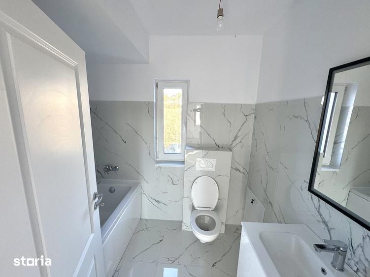 Casă cu 4 camere cu Teren 300 Mp în Bucium