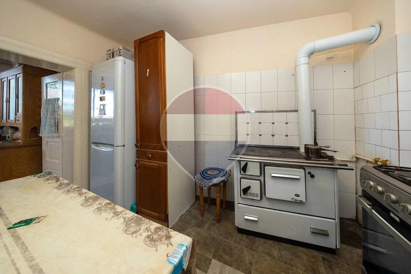 Casă cu Teren 1900 Mp în Central