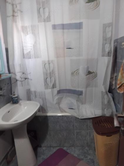 Apartament cu 3 camere decomandat în Filiași