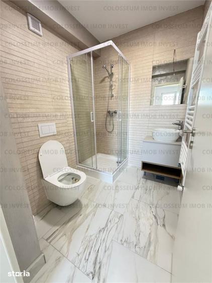 Apartament cu 3 camere decomandat în Tractorul