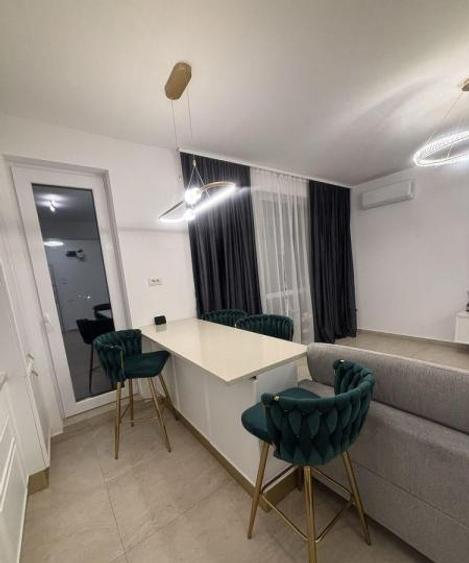 Apartament cu 2 camere semidecomandat, mobilat în Baicului