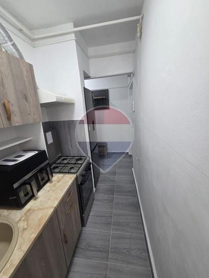 Apartament cu 2 camere semidecomandat, mobilat în Central